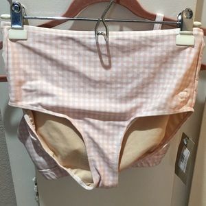New. Never used. Two piece bikini. Medium on both. There is two little stains